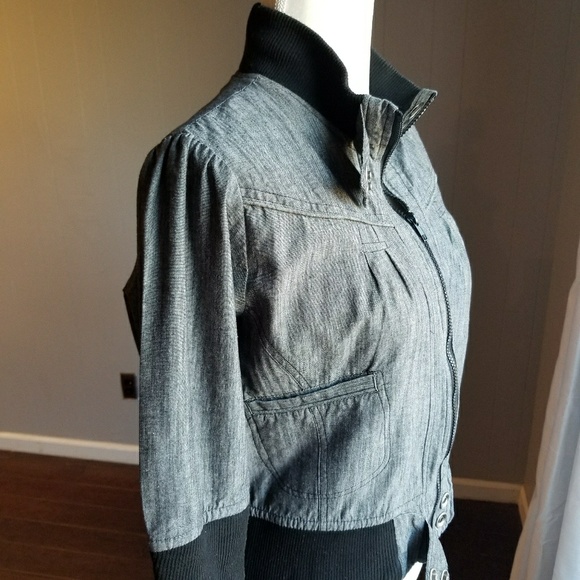 Gray and black jacket with grommet details. - Picture 3 of 8